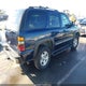 1GNEK13T34R299553 2004 Chevrolet Tahoe Lt auction photo thumbnail 4