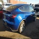 7SAYGDEEXPA032489 2023 Tesla Model Y Awd/Long Range Dual Motor All-Wheel Drive auction photo thumbnail 4