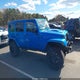 1C4BJWEG1FL710739 2015 Jeep Wrangler Unlimited Sahara auction photo thumbnail 14