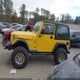 1J4FA49S8YP762461 2000 Jeep Wrangler Sport auction photo thumbnail 14