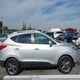 KM8JUCAG4EU860064 2014 Hyundai Tucson Se auction photo thumbnail 12