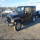1C4BJWDG4FL519432 2015 Jeep Wrangler Unlimited Sport auction photo thumbnail 2