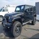 1C4BJWEG4DL561417 2013 Jeep Wrangler Unlimited Sahara auction photo thumbnail 2