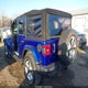 1C4HJXEG5JW256700 2018 Jeep Wrangler Unlimited Sahara 4X4 auction photo thumbnail 3