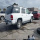 1GNEK13T03R249465 2003 Chevrolet Tahoe Z71 auction photo thumbnail 4