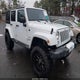 1C4HJWEG9GL152019 2016 Jeep Wrangler Unlimited Sahara auction photo thumbnail 1