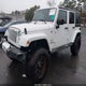 1C4HJWEG9GL152019 2016 Jeep Wrangler Unlimited Sahara auction photo thumbnail 2
