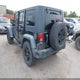 1J4HA3H15AL124726 2010 Jeep Wrangler Unlimited Sport auction photo thumbnail 3