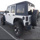 1C4HJWDG2DL569561 2013 Jeep Wrangler Unlimited Freedom Edition auction photo thumbnail 3