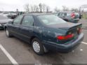 4T1BG22K2VU037447 1997 Toyota Camry Le auction photo thumbnail 6