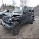 1C4BJWDG2EL299027 2014 Jeep Wrangler Unlimited Willys Wheeler auction photo thumbnail 2