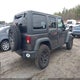 1C4BJWDG2EL299027 2014 Jeep Wrangler Unlimited Willys Wheeler auction photo thumbnail 4