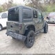 1C4BJWDG1FL768254 2015 Jeep Wrangler Unlimited Willys Wheeler auction photo thumbnail 4