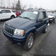 1J4GW58N81C675678 2001 Jeep Grand Cherokee Limited auction photo thumbnail 2