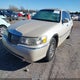 1LNHM83W1XY641381 1999 Lincoln Town Car Cartier auction photo thumbnail 2