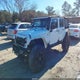 1C4BJWDG4FL506499 2015 Jeep Wrangler Unlimited Sport auction photo thumbnail 2