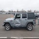 1C4BJWDG9FL668676 2015 Jeep Wrangler Unlimited Sport auction photo thumbnail 14