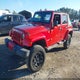 1J4HA5H10BL512718 2011 Jeep Wrangler Unlimited Sahara auction photo thumbnail 2