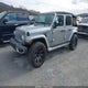 1C4HJXEGXJW151425 2018 Jeep Wrangler Unlimited Sahara 4X4 auction photo thumbnail 2