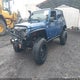 1J4BA3H15AL223889 2010 Jeep Wrangler Unlimited Sport auction photo thumbnail 2