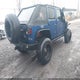 1J4BA3H15AL223889 2010 Jeep Wrangler Unlimited Sport auction photo thumbnail 4