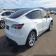 7SAYGDEE4PA134810 2023 Tesla Model Y Awd/Long Range Dual Motor All-Wheel Drive auction photo thumbnail 4
