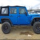1C4BJWDGXGL119537 2016 Jeep Wrangler Unlimited Sport auction photo thumbnail 14