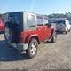 1J4GA59129L753619 2009 Jeep Wrangler Unlimited Sahara auction photo thumbnail 4
