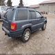 1J4GW48S01C625129 2001 Jeep Grand Cherokee Laredo auction photo thumbnail 4