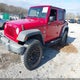 1J4BA3H11AL101448 2010 Jeep Wrangler Unlimited Sport auction photo thumbnail 2