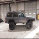 1JCMT7897JT219024 1988 Jeep Cherokee Limited auction photo thumbnail 12