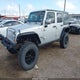 1C4HJWDG0CL214256 2012 Jeep Wrangler Unlimited Sport auction photo thumbnail 2