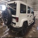 1C4BJWEG0HL637561 2017 Jeep Wrangler Unlimited Smoky Mountain 4X4 auction photo thumbnail 4