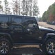 1C4HJWEG5EL214562 2014 Jeep Wrangler Unlimited Sahara auction photo thumbnail 13