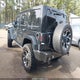 1C4HJWEG5EL214562 2014 Jeep Wrangler Unlimited Sahara auction photo thumbnail 3