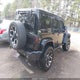 1C4HJWEG5EL214562 2014 Jeep Wrangler Unlimited Sahara auction photo thumbnail 4