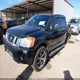 1N6BA0EC7EN515562 2014 Nissan Titan Pro-4X auction photo thumbnail 2