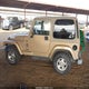 1J4FA59S1YP777454 2000 Jeep Wrangler Sahara auction photo thumbnail 14