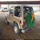 1J4FA59S1YP777454 2000 Jeep Wrangler Sahara auction photo thumbnail 3