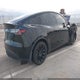 7SAYGDEE5PA128756 2023 Tesla Model Y Awd/Long Range Dual Motor All-Wheel Drive auction photo thumbnail 4