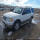 1FMFU18L24LA30636 2004 Ford Expedition Eddie Bauer auction photo thumbnail 2
