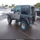 1J4FA49S8YP712403 2000 Jeep Wrangler Sport auction photo thumbnail 3