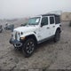 1C4HJXEG6JW125212 2018 Jeep Wrangler Unlimited Sahara 4X4 auction photo thumbnail 2