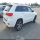 1C4RJFCG9EC587451 2014 Jeep Grand Cherokee Overland auction photo thumbnail 4