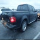 1FTRW073X2KE07935 2002 Ford F-150 Lariat auction photo thumbnail 4