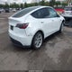 7SAYGDEE4PA038062 2023 Tesla Model Y Awd/Long Range Dual Motor All-Wheel Drive auction photo thumbnail 4