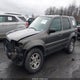 1FMCU94165KB03178 2005 Ford Escape Limited auction photo thumbnail 2