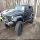 1C4BJWDG4GL348487 2016 Jeep Wrangler Unlimited Sport auction photo thumbnail 2