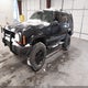 1J4FF48S8YL136810 2000 Jeep Cherokee Sport auction photo thumbnail 2