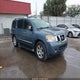 5N1BA0ND7BN610514 2011 Nissan Armada Sl auction photo thumbnail 1